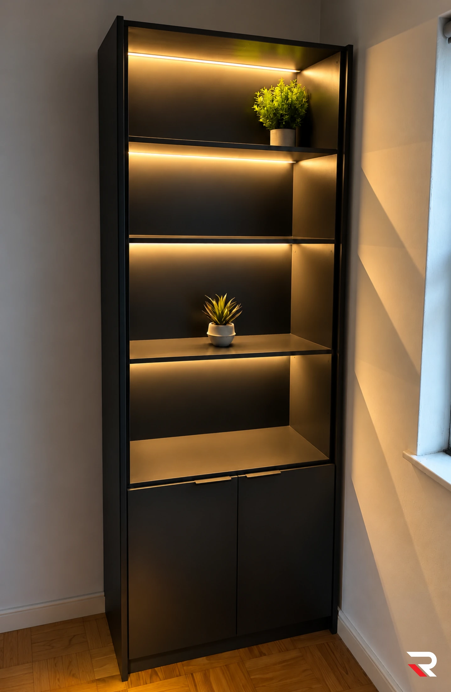 Completed warm LED shelf lighting in dark joinery